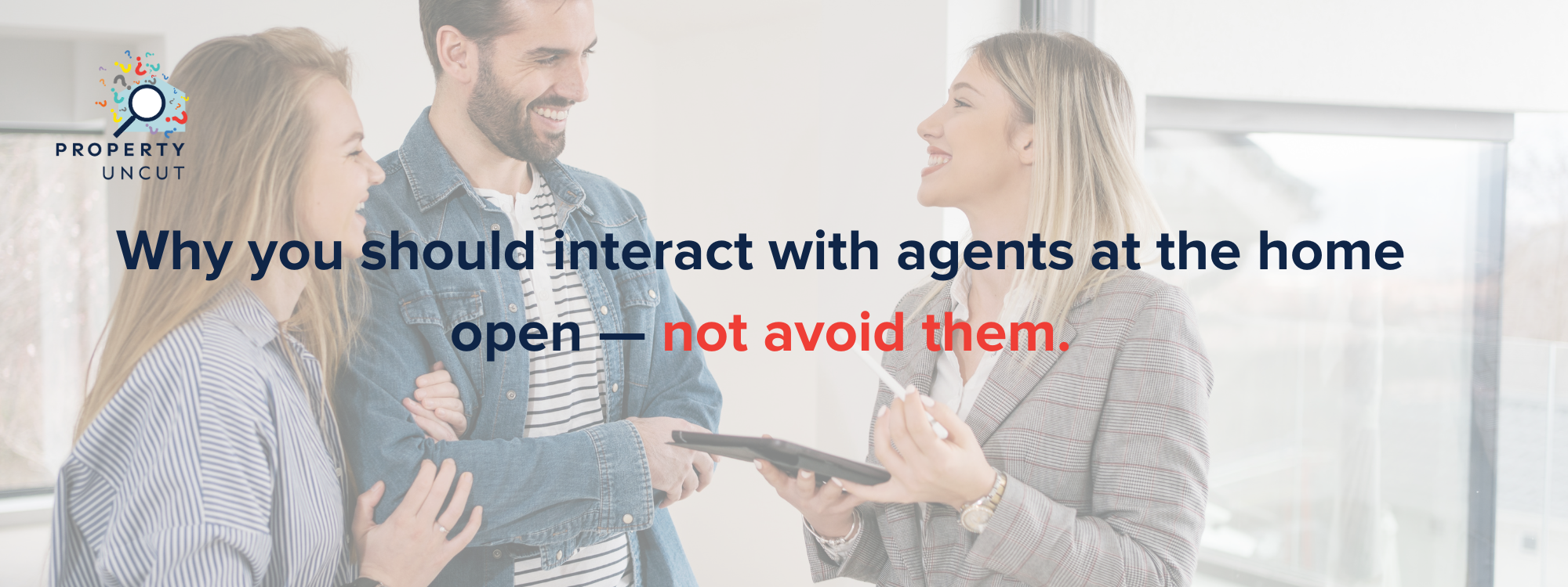 A couple speaking with a real estate agent at a home open, representing the importance of engaging with agents during property viewings.