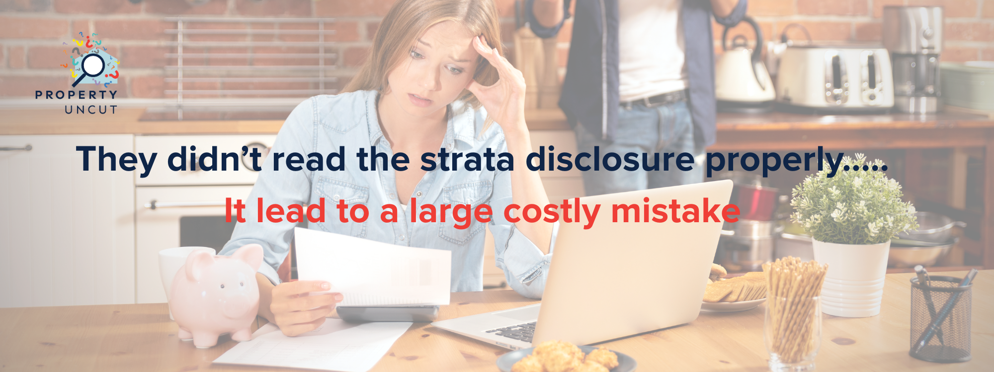 Stressed woman reviewing property documents at a kitchen table, showing concern over unexpected costs.